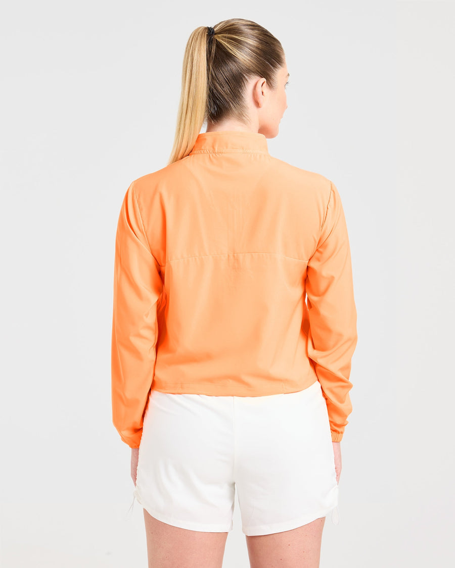 Run 1/2 Zip Jacket - Vibrant Apricot